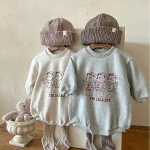 [66-90cm] クマ柄 ロンパース