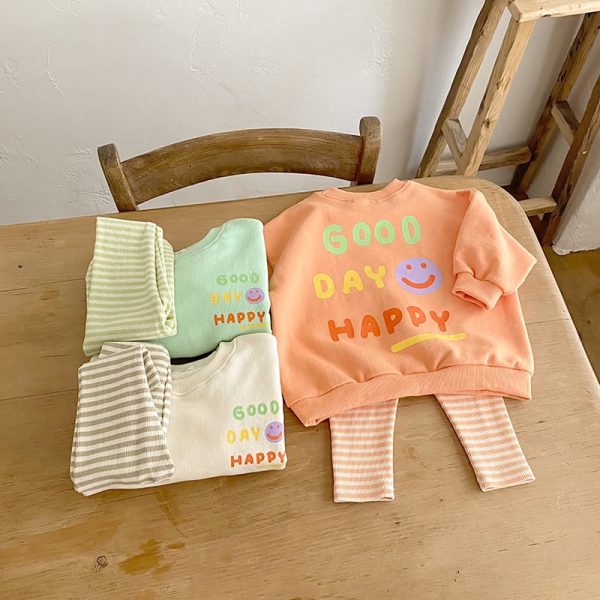 [66-90cm]スウェット スマイル柄 英字 可愛い トップス
